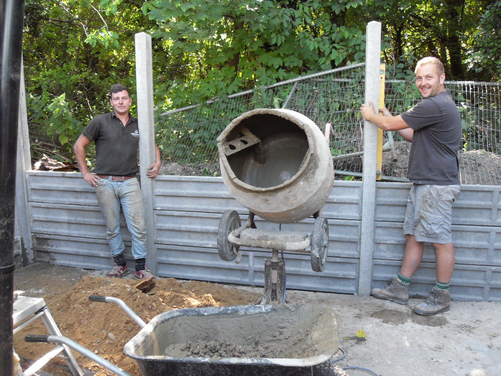 we decided on three layers of gravel boards as their is a bank of earth at the back and we don't want the fence to rot
