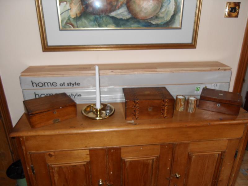 The new floor is stored behind a piece of furniture